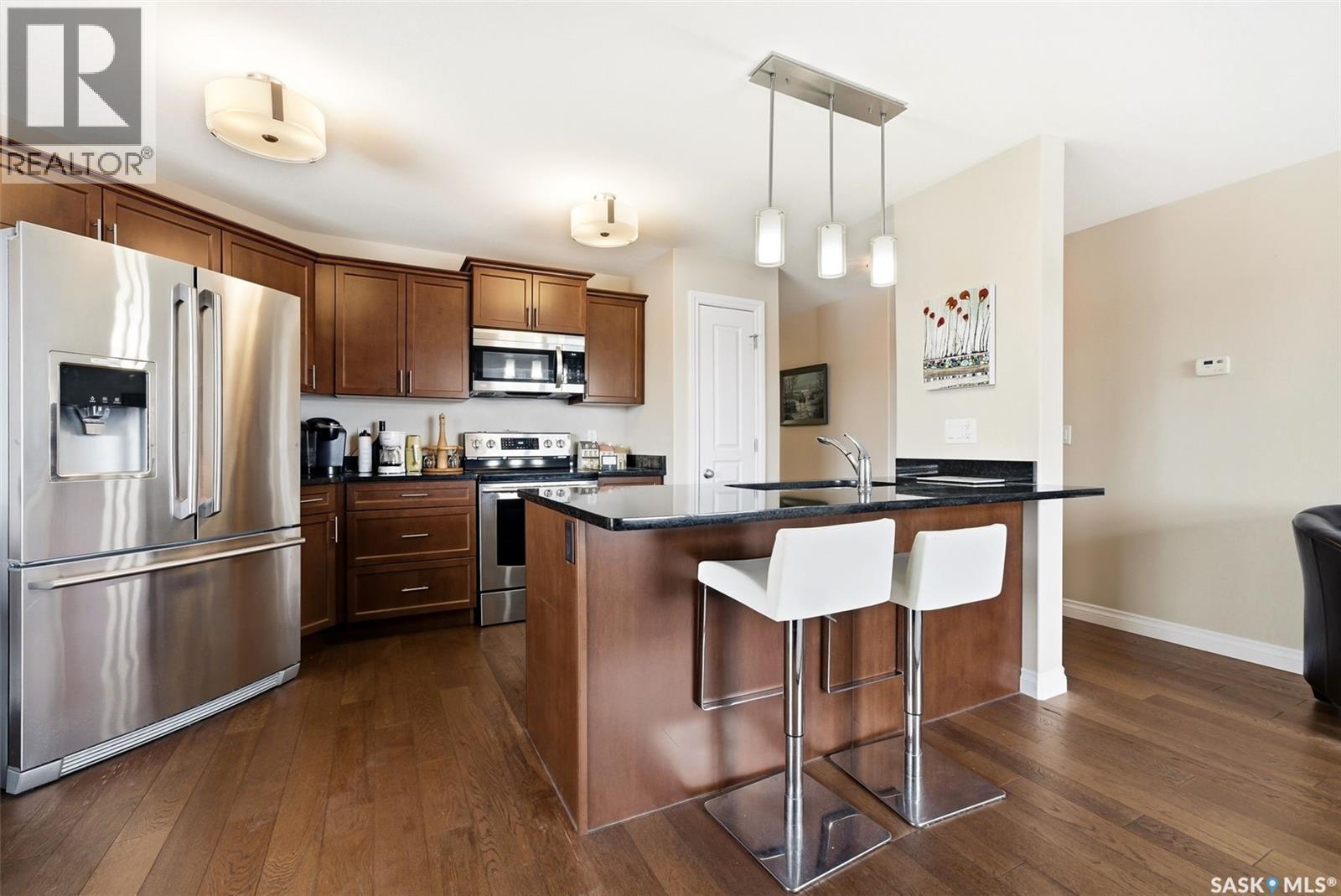 214 3630 Haughton Road E, Regina, SK - Indoor Photo Showing Kitchen With Upgraded Kitchen