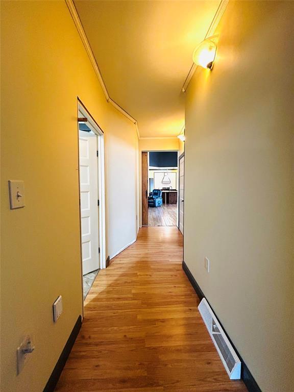 Hallway looking out from the primary bedroom. - Pierson, Manitoba