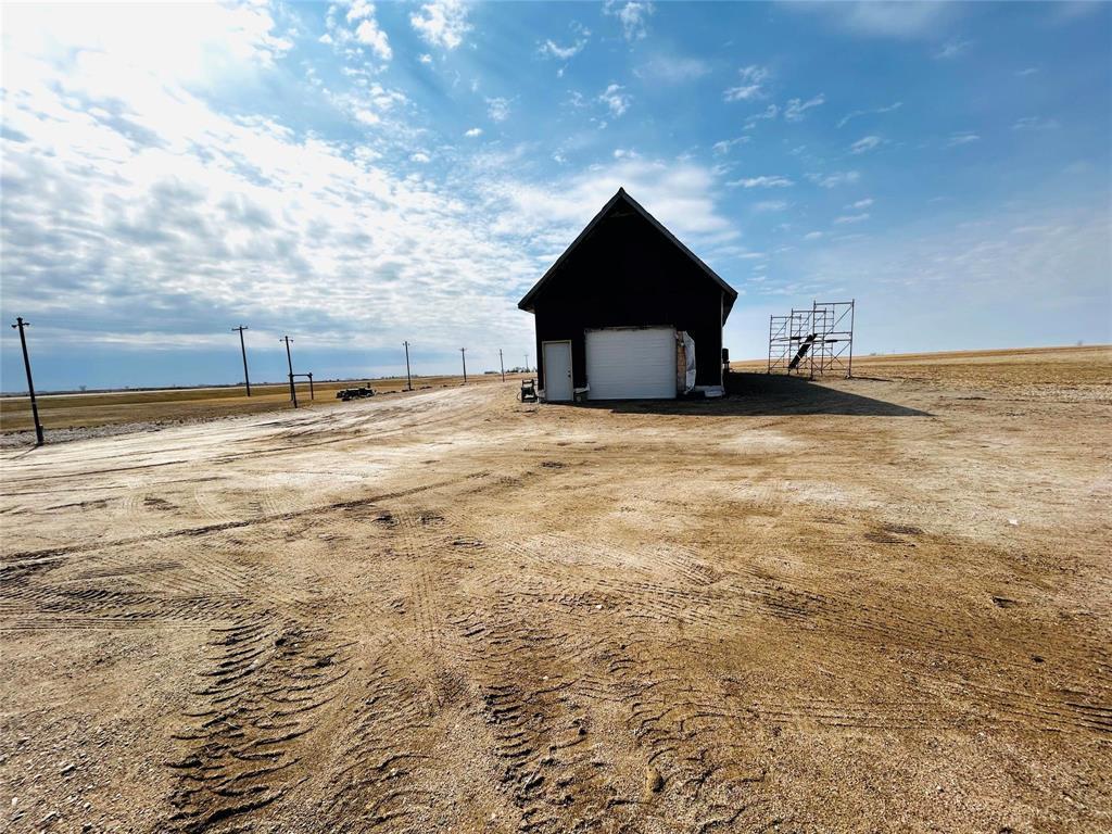 A view of the side of the home where the attached garage is. - Pierson, Manitoba