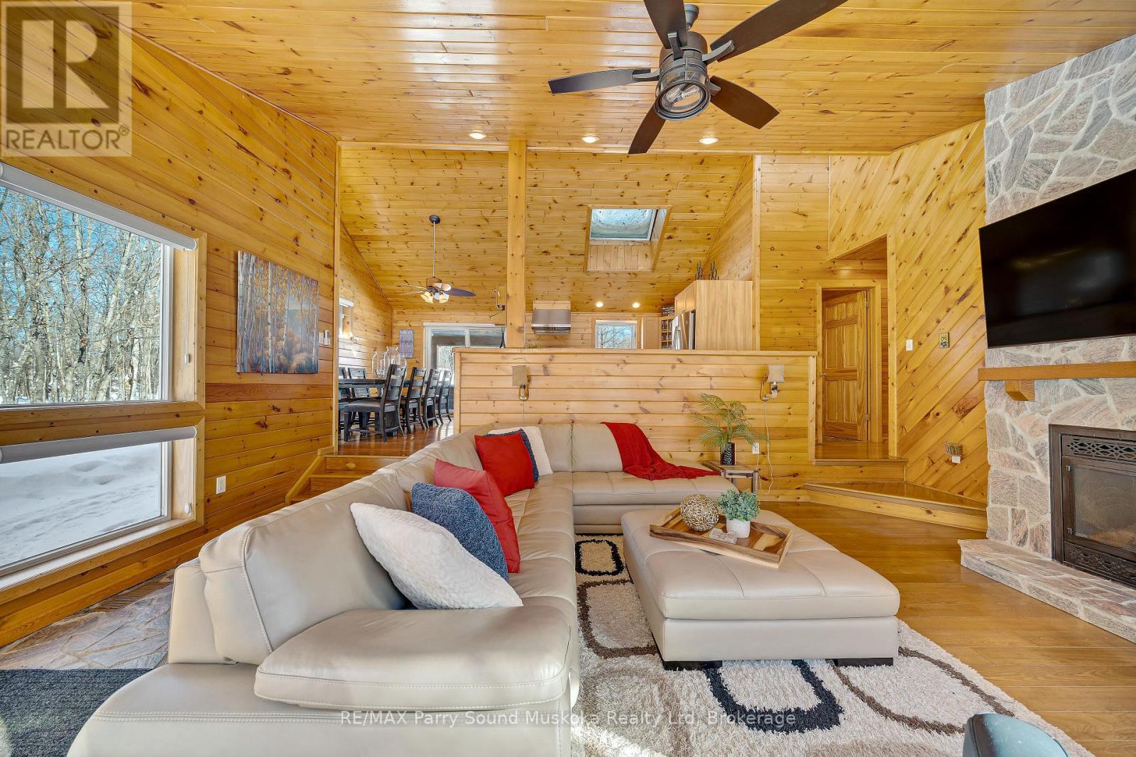 587 Centre Road, Mckellar, ON - Indoor Photo Showing Living Room With Fireplace