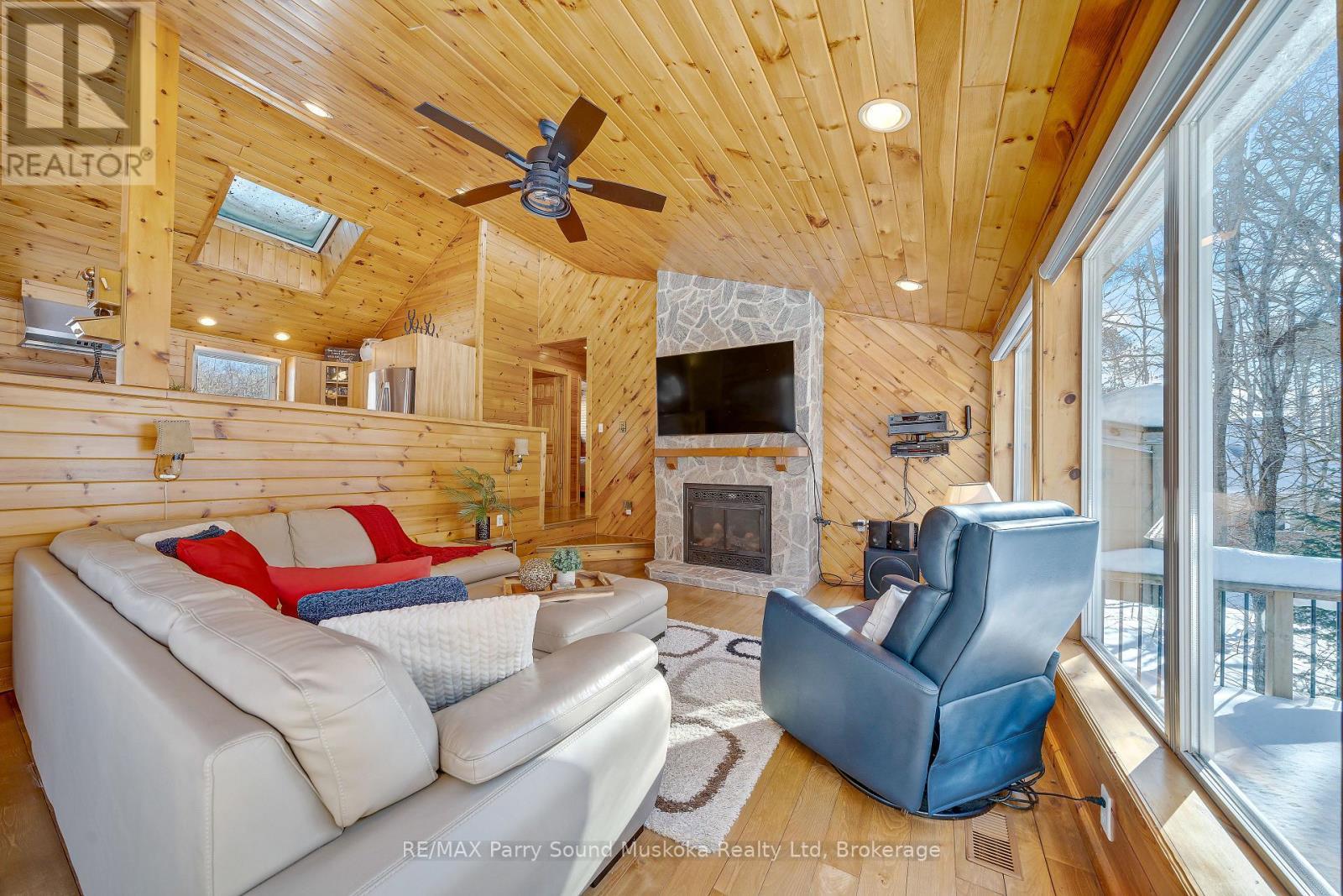 587 Centre Road, Mckellar, ON - Indoor Photo Showing Living Room With Fireplace
