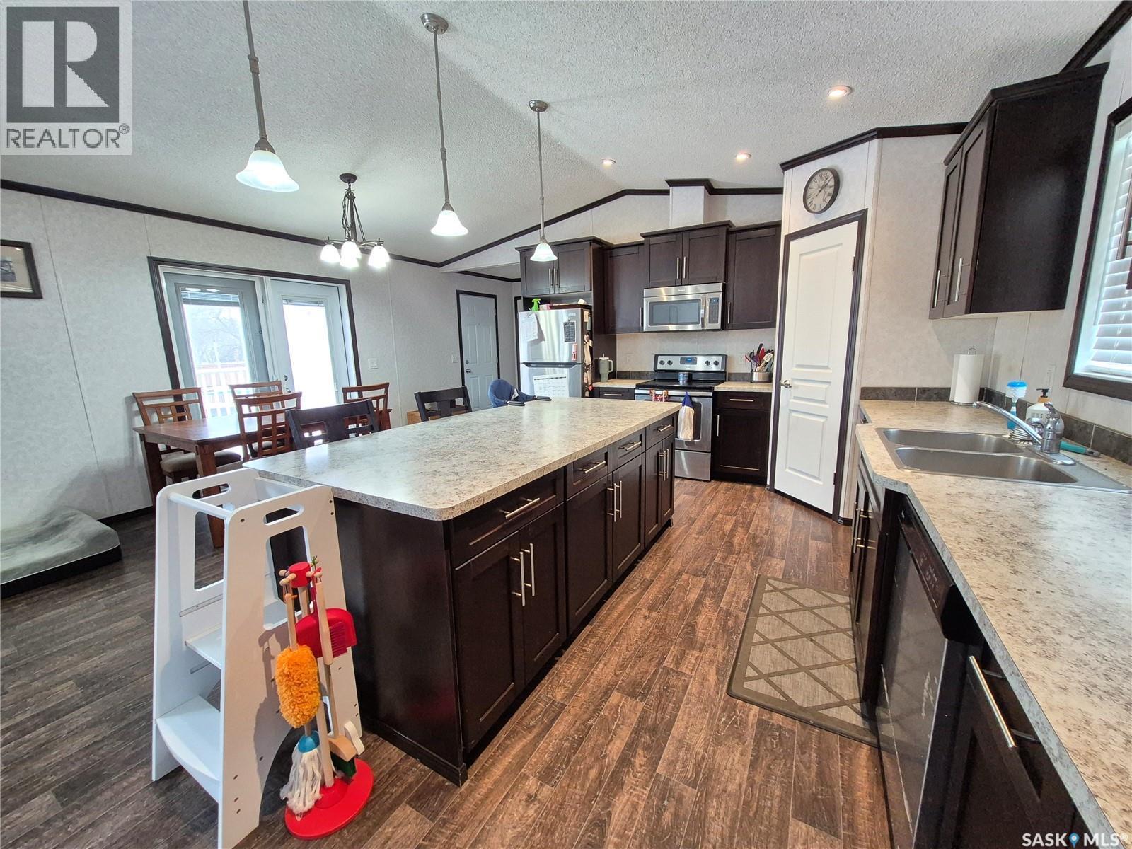 151 2Nd Avenue, Bengough, SK - Indoor Photo Showing Kitchen With Stainless Steel Kitchen With Double Sink