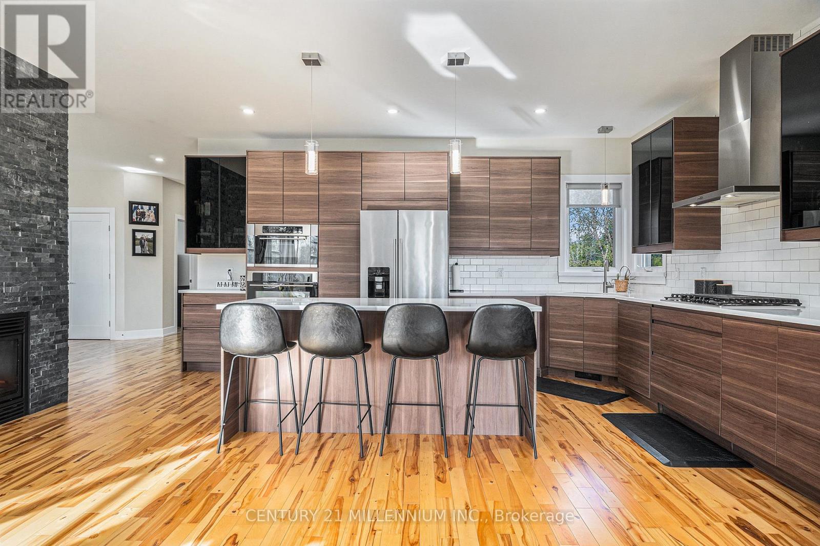 6470 Apple Orchard Road, Ottawa, ON - Indoor Photo Showing Kitchen With Fireplace With Upgraded Kitchen