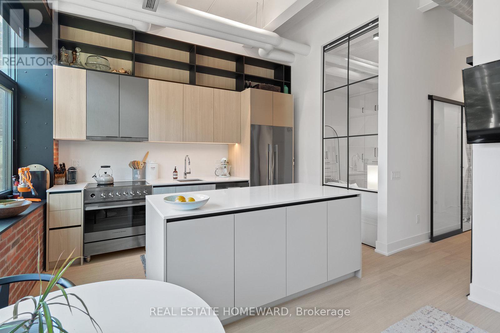 High Ceilings - 207 - 150 Logan Avenue, Toronto, ON - Indoor Photo Showing Kitchen