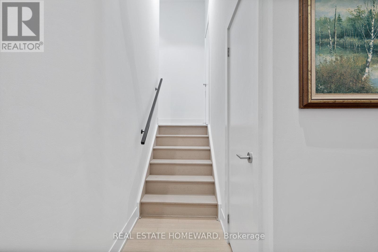 Stairs to Entry - 207 - 150 Logan Avenue, Toronto, ON - Indoor Photo Showing Other Room