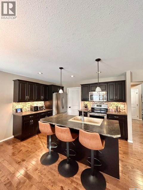5245 Canuck Crescent, Regina, SK - Indoor Photo Showing Kitchen With Stainless Steel Kitchen With Upgraded Kitchen