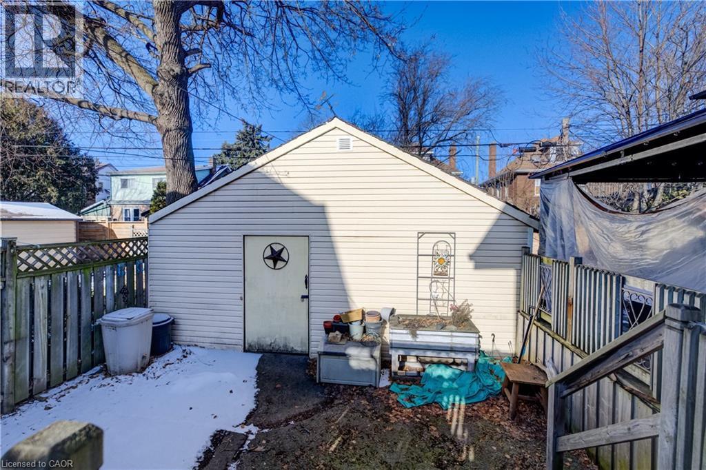 converted double garage, can be converted back to garage - 12 Leinster Avenue S, Hamilton, ON - Outdoor With Deck Patio Veranda With Exterior