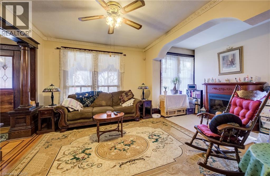 original elegance & charm - 12 Leinster Avenue S, Hamilton, ON - Indoor Photo Showing Living Room With Fireplace