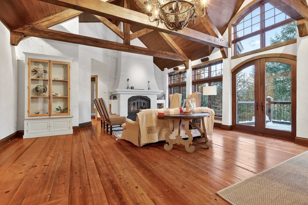 Living Room - 1015 Ch. Cochrane, Mont-Tremblant, QC - Indoor With Fireplace