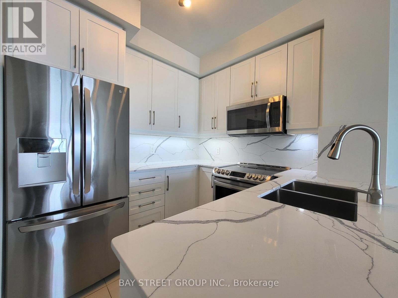 3608 - 50 Absolute Avenue, Mississauga, ON - Indoor Photo Showing Kitchen With Stainless Steel Kitchen With Double Sink With Upgraded Kitchen