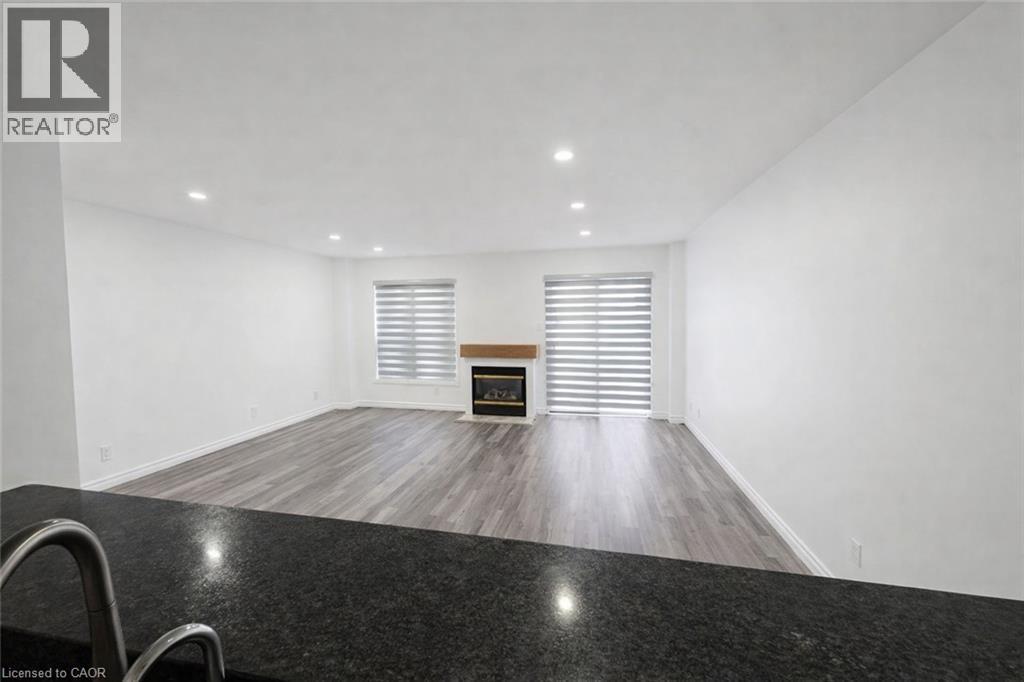 268 Blackhorne Drive, Kitchener, ON - Indoor With Fireplace