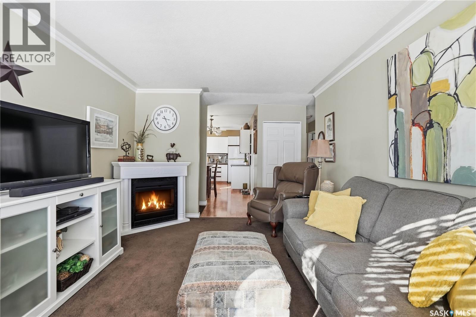 39 Bedford Crescent, Regina, SK - Indoor Photo Showing Living Room With Fireplace