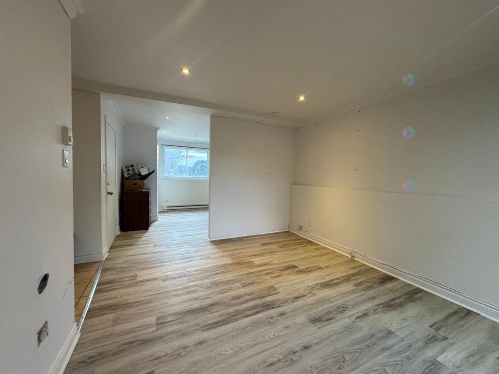 Salon - 4-917 Rue Front, Longueuil (Le Vieux-Longueuil), QC - Indoor Photo Showing Other Room