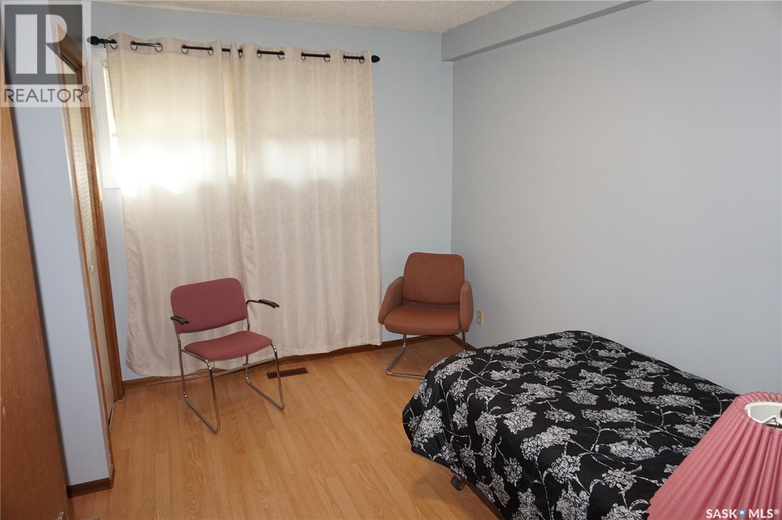 46 Rogers Place, Regina, SK - Indoor Photo Showing Bedroom