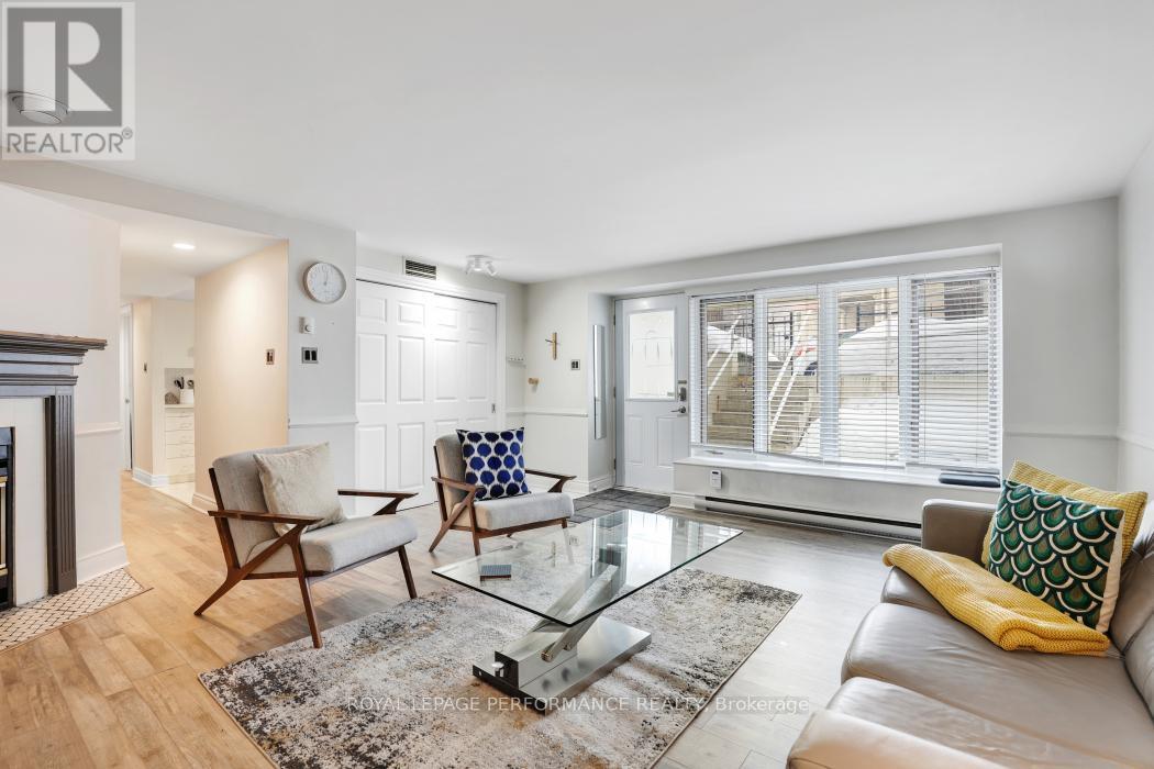 3 - 292 Laurier Avenue E, Ottawa, ON - Indoor Photo Showing Living Room With Fireplace
