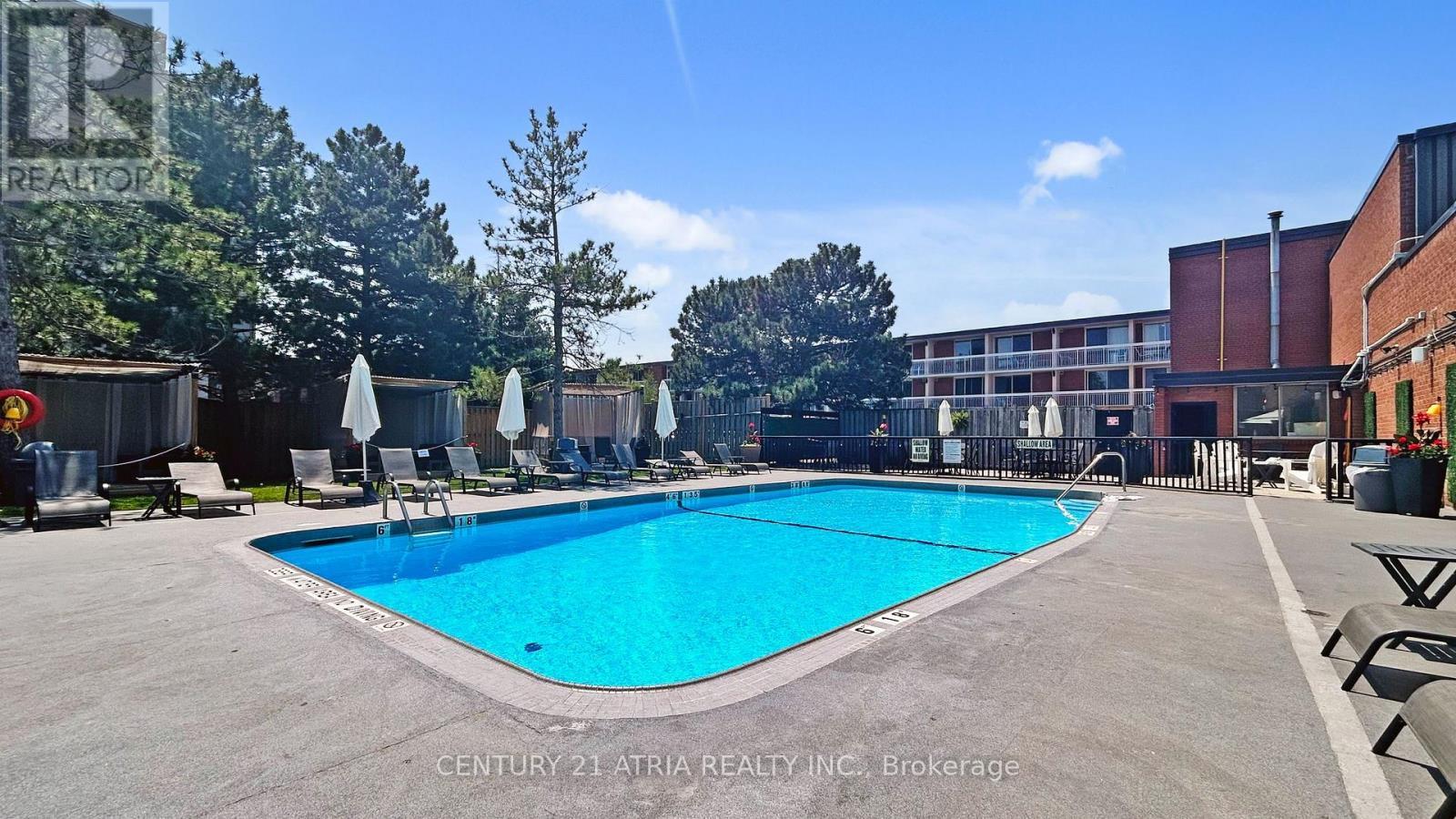719 - 9015 Leslie Street, Richmond Hill, ON - Outdoor With In Ground Pool With Backyard
