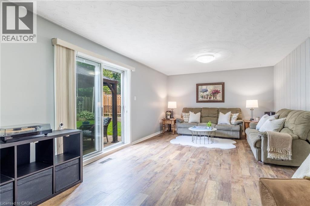 Walk-Out Family Room - 63 Lionsgate Avenue, Hamilton, ON - Indoor Photo Showing Living Room