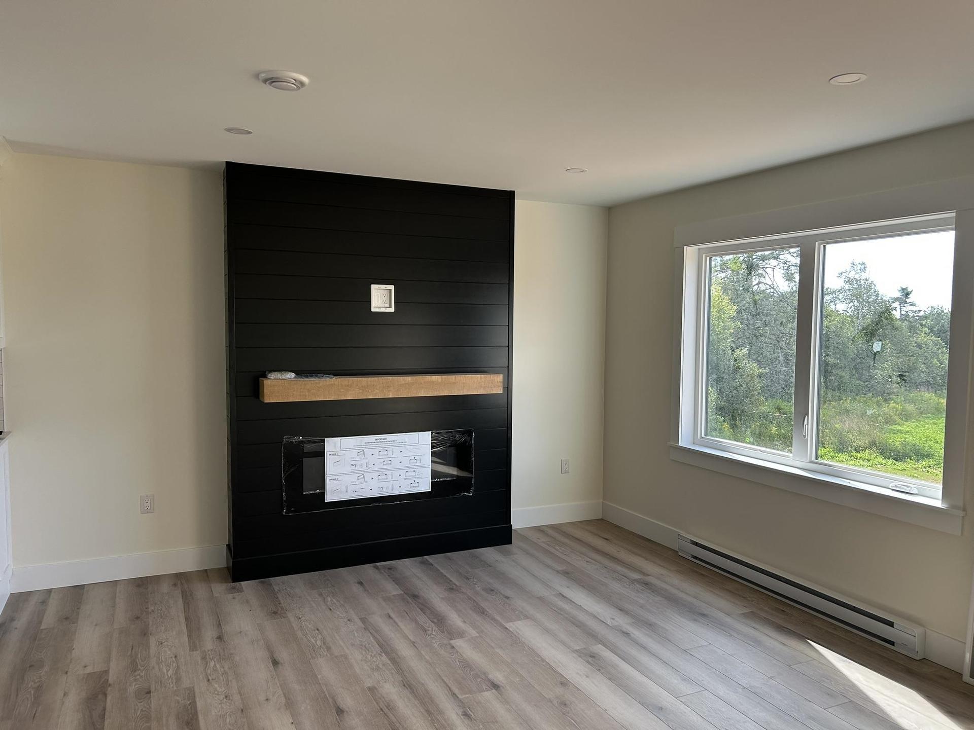 250 Ferry Road, Cornwall, PE - Indoor With Fireplace