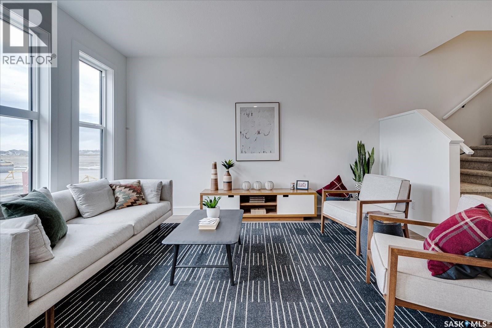 61 Rosewood Boulevard E, Saskatoon, SK - Indoor Photo Showing Living Room