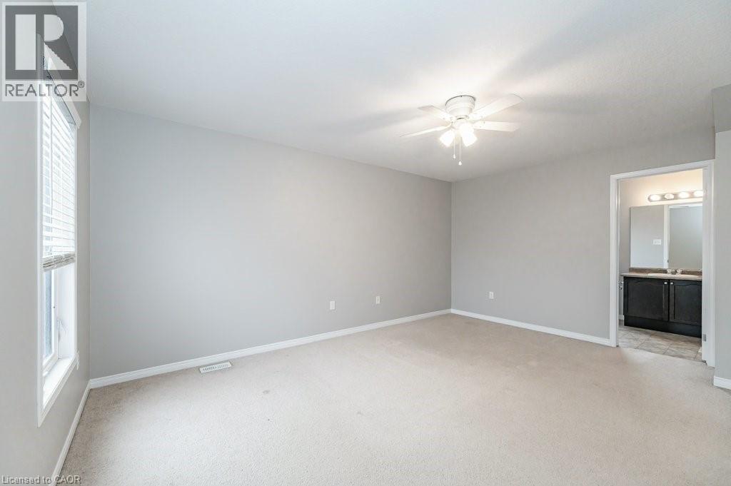 primary suite with 4pc ensuite - 39 Brookfield Crescent, Kitchener, ON - Indoor Photo Showing Other Room