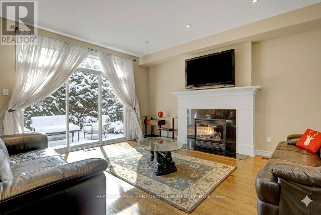 318 Iona Street, Ottawa, ON - Indoor Photo Showing Living Room With Fireplace