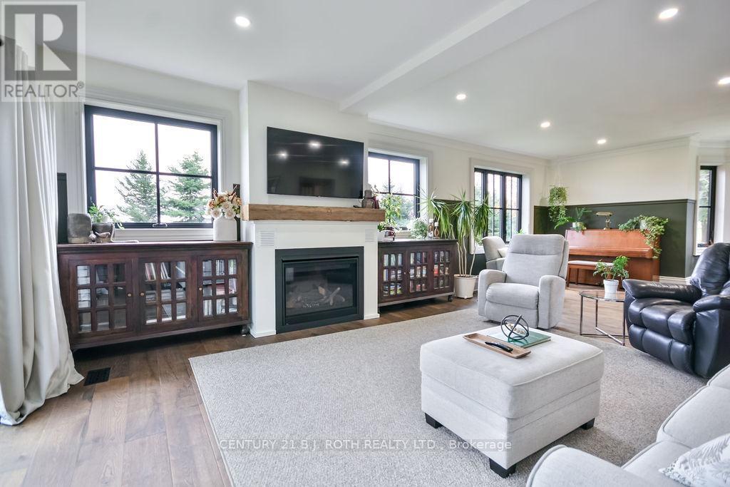 1803 Old Second Road N, Springwater, ON - Indoor Photo Showing Living Room With Fireplace