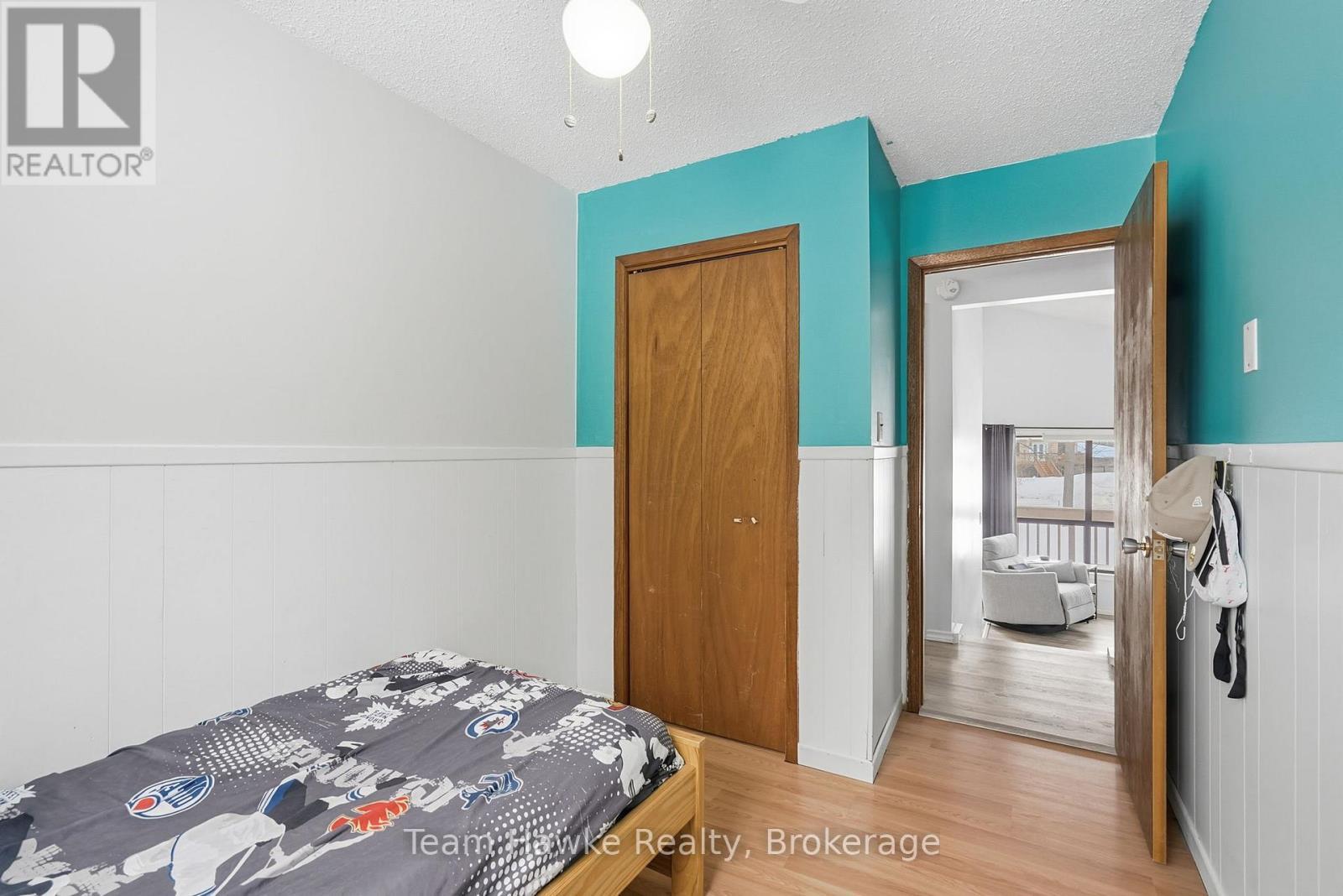 77 Tall Pines Drive, Tiny, ON - Indoor Photo Showing Bedroom