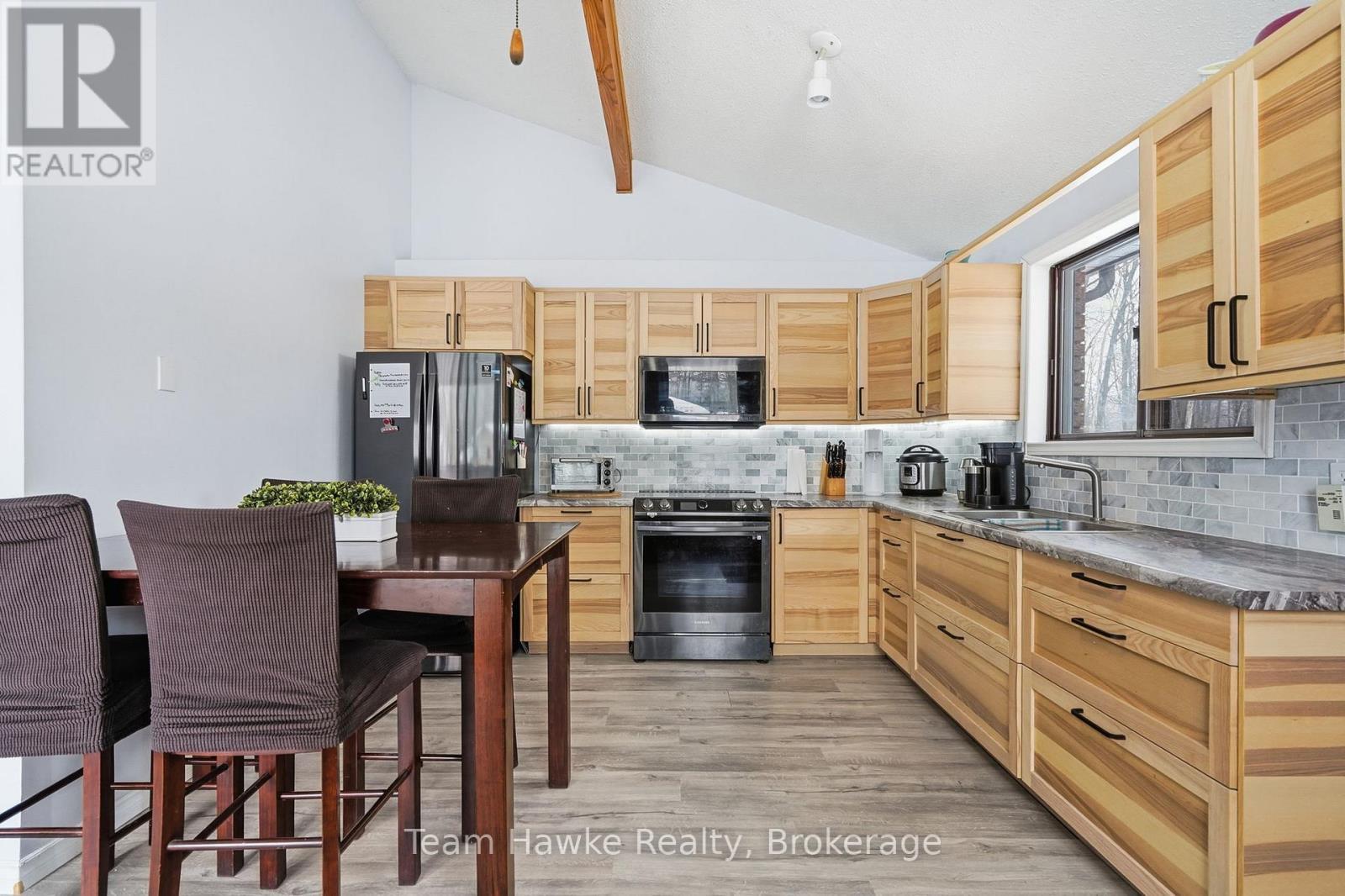77 Tall Pines Drive, Tiny, ON - Indoor Photo Showing Kitchen With Double Sink