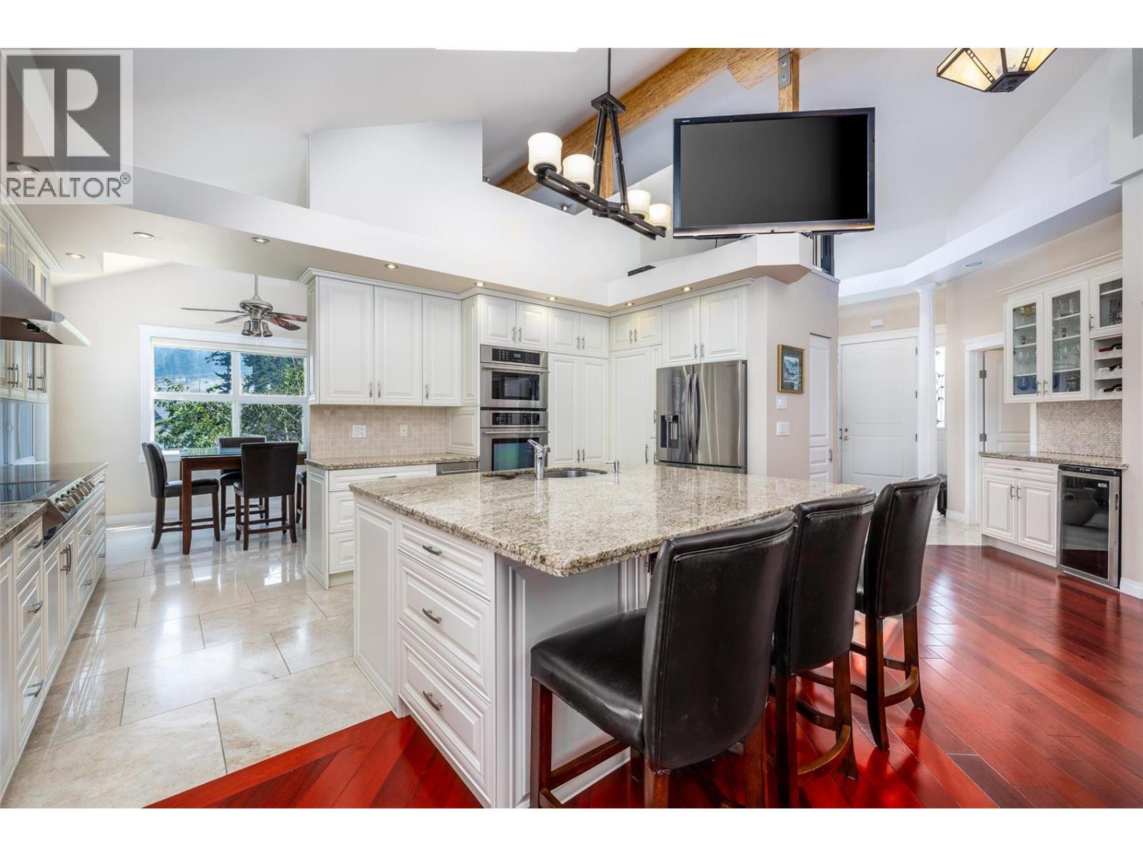 European influenced design - 375 Trumpeter Court, Kelowna, BC - Indoor Photo Showing Kitchen With Upgraded Kitchen
