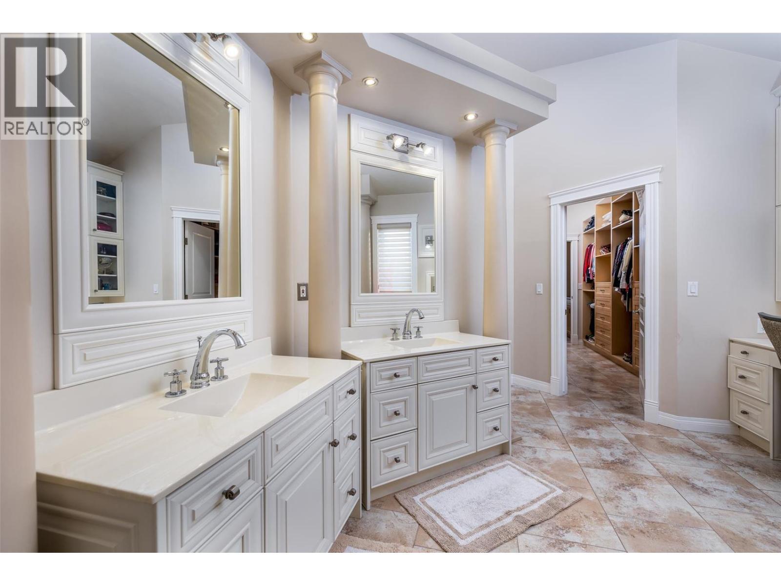 Double sink - 375 Trumpeter Court, Kelowna, BC - Indoor Photo Showing Bathroom
