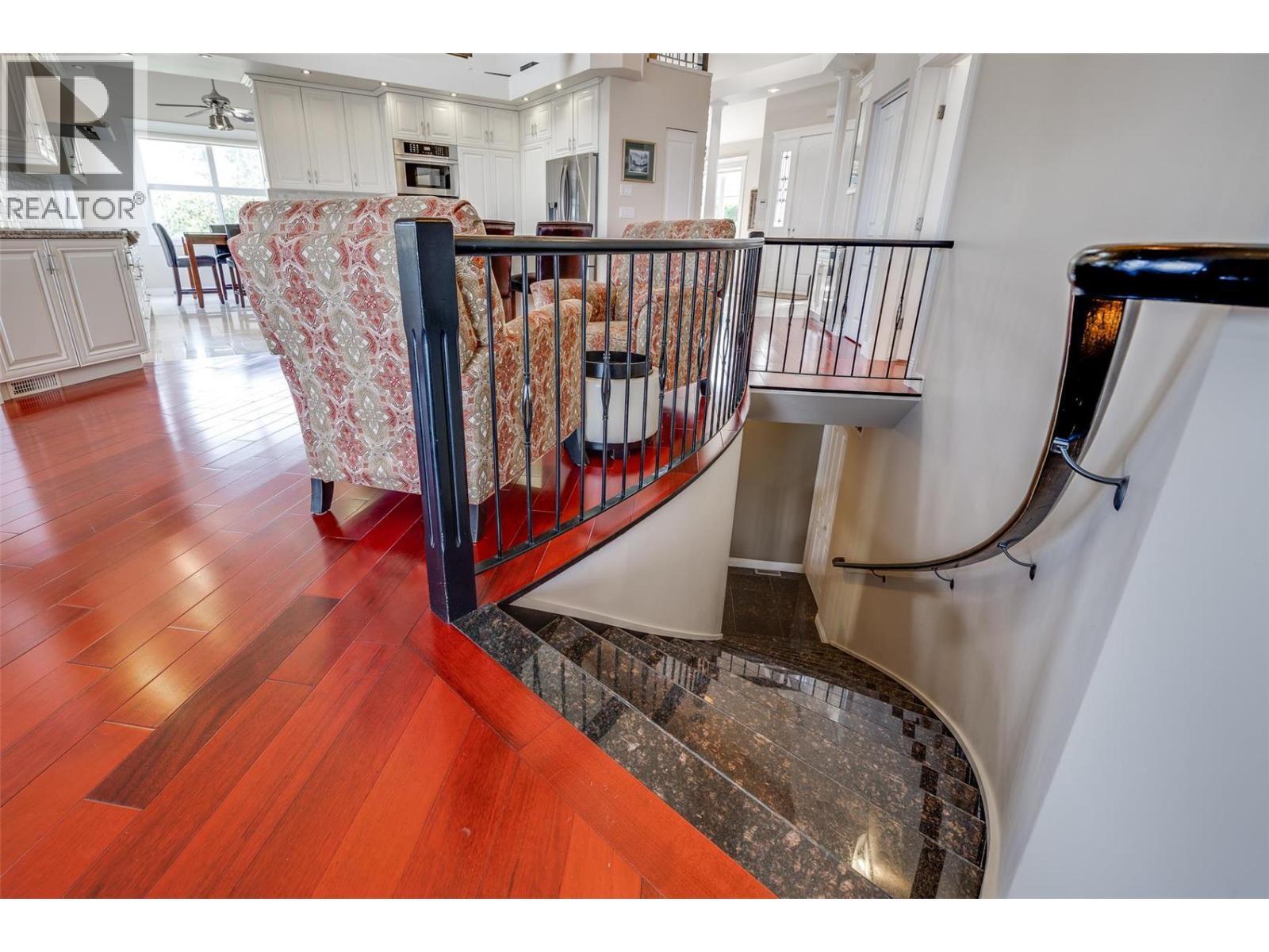 Granite stairs - 375 Trumpeter Court, Kelowna, BC - Indoor Photo Showing Other Room