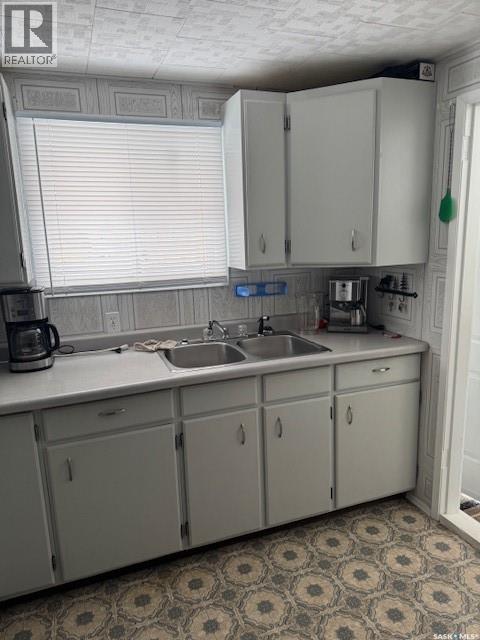 692 Aqualane Avenue, Aquadeo, SK - Indoor Photo Showing Kitchen With Double Sink