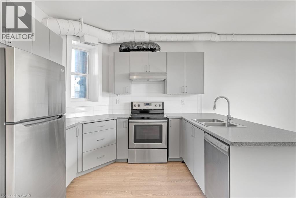 657 Barton Street E Unit# 302, Hamilton, ON - Indoor Photo Showing Kitchen With Stainless Steel Kitchen With Double Sink With Upgraded Kitchen