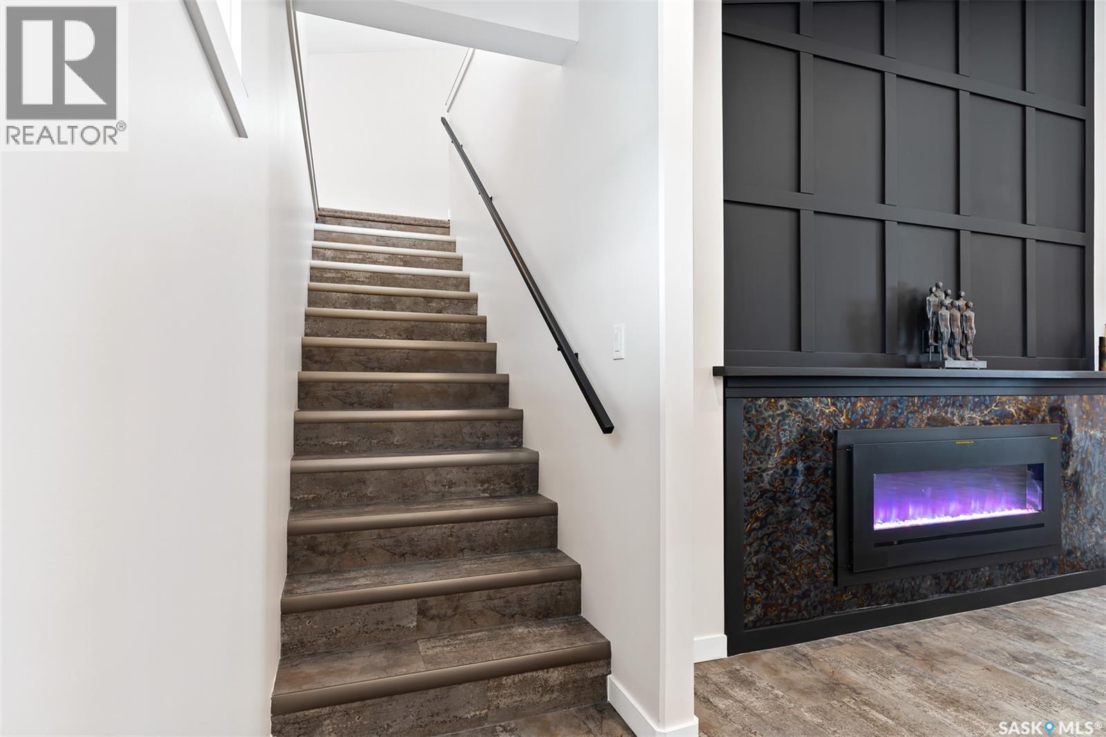 9 70 8Th Avenue, Lumsden, SK - Indoor Photo Showing Other Room With Fireplace