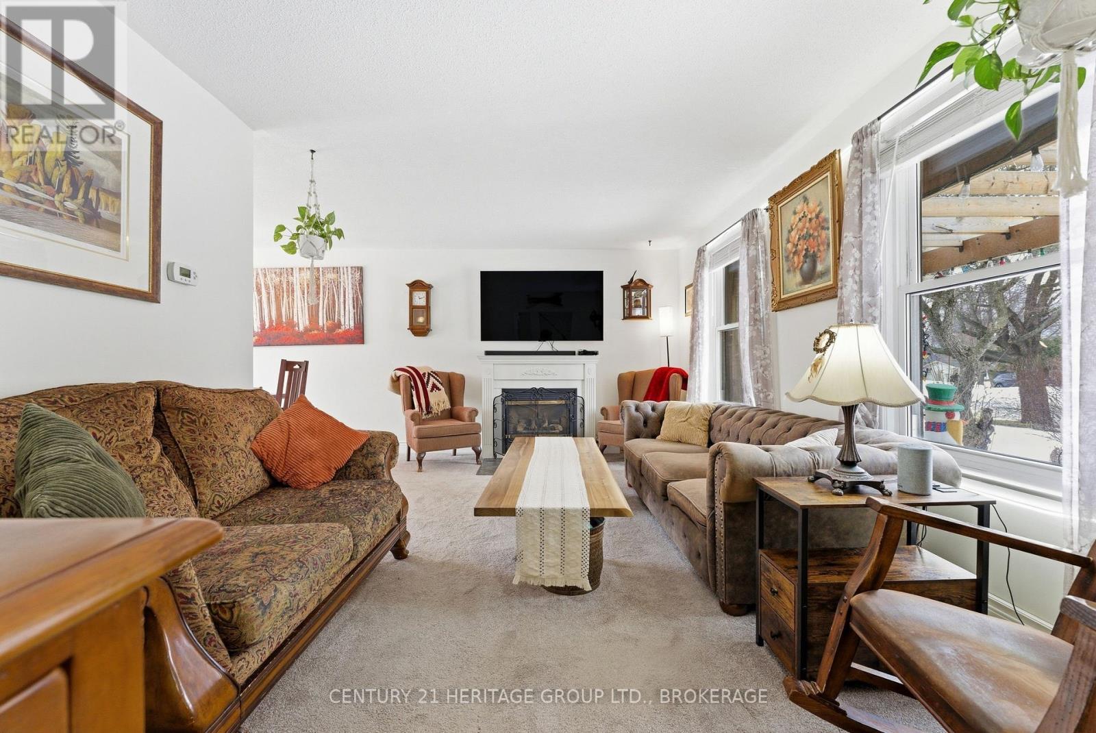 205 Keewatin Street, Oshawa (Donevan), ON - Indoor Photo Showing Living Room With Fireplace