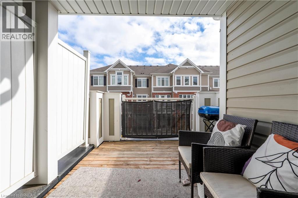 View of patio with a residential view - 143 Ridge Road Unit# 48, Cambridge, ON - Outdoor With Exterior