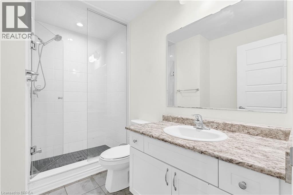 Bathroom featuring a stall shower and vanity - 143 Ridge Road Unit# 48, Cambridge, ON - Indoor Photo Showing Bathroom