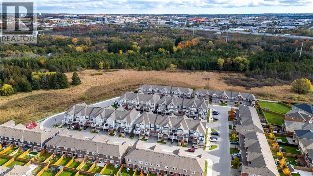 Aerial view of residential area featuring a forest - 143 Ridge Road Unit# 48, Cambridge, ON - Outdoor With View