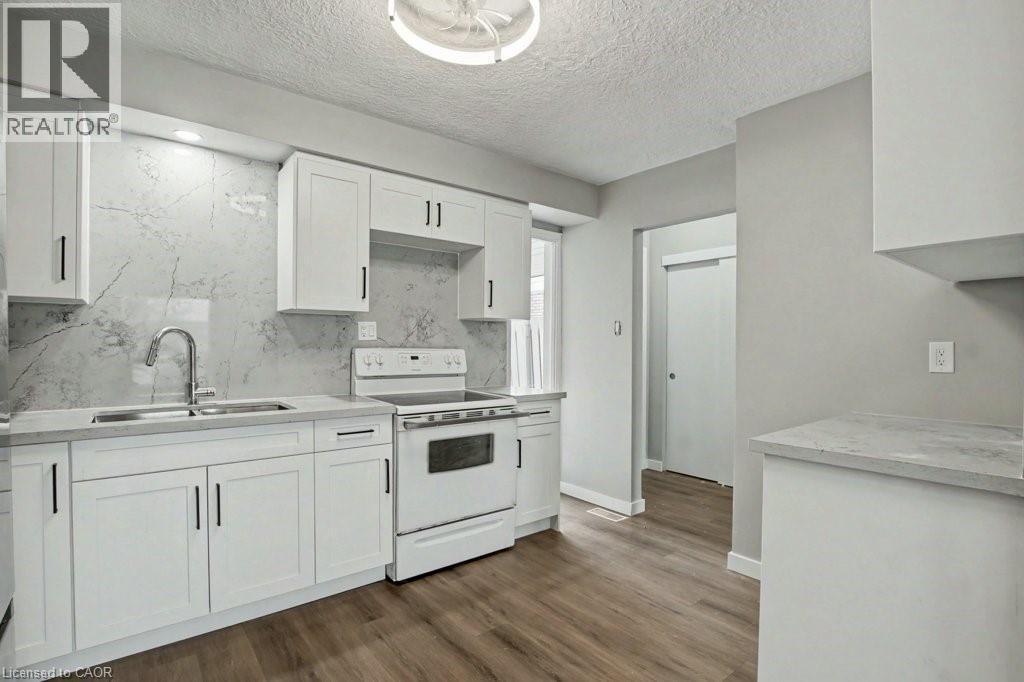 104 Ralgreen Crescent, Kitchener, ON - Indoor Photo Showing Kitchen With Double Sink