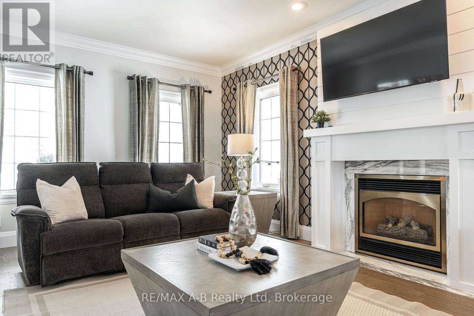 4609 Road 164, West Perth (Logan), ON - Indoor Photo Showing Living Room With Fireplace