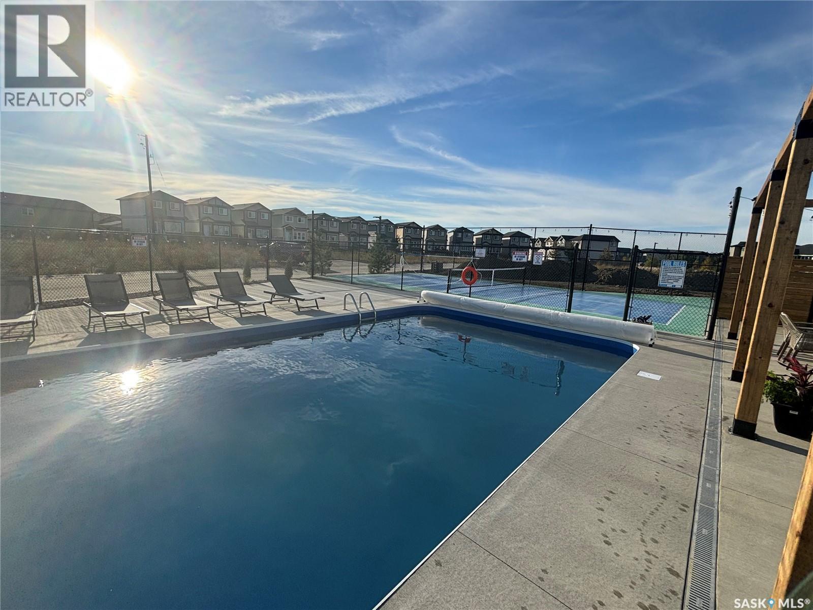 29 105 Hathway Crescent, Saskatoon, SK - Outdoor With In Ground Pool With View
