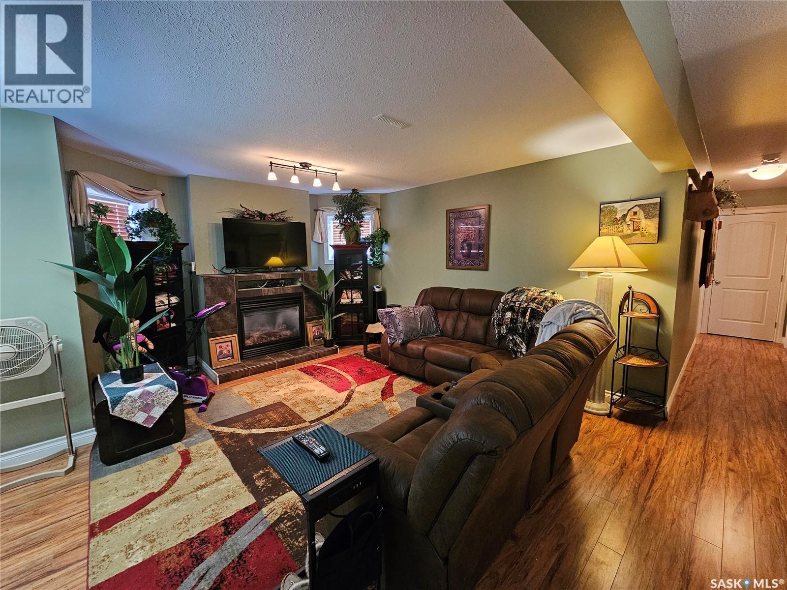 30 St Boniface Avenue, Goodsoil, SK - Indoor Photo Showing Living Room With Fireplace