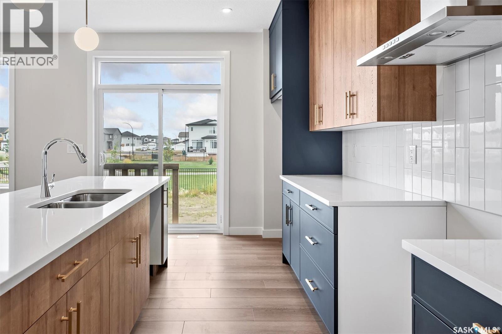 107 Katz Avenue, Saskatoon, SK - Indoor Photo Showing Kitchen With Double Sink