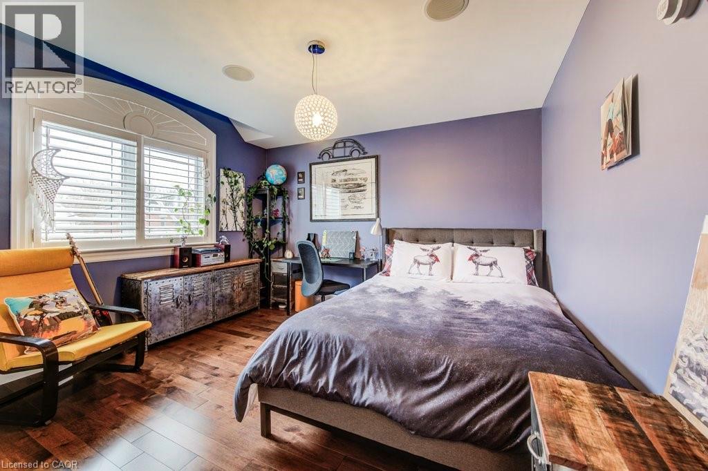 Hardwood flooring & double closet - 124 Allen Street E, Waterloo, ON - Indoor Photo Showing Bedroom
