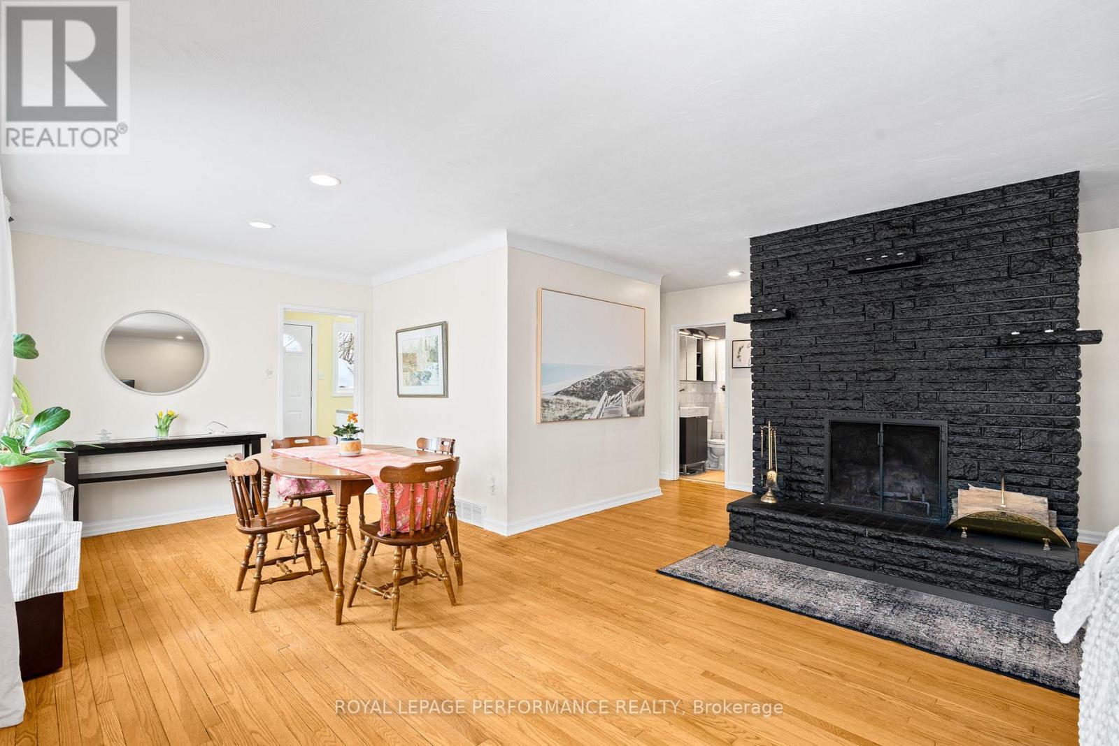 Dining space near fireplace - 1430 Edgecliffe Avenue, Ottawa, ON - Indoor Photo Showing Living Room With Fireplace
