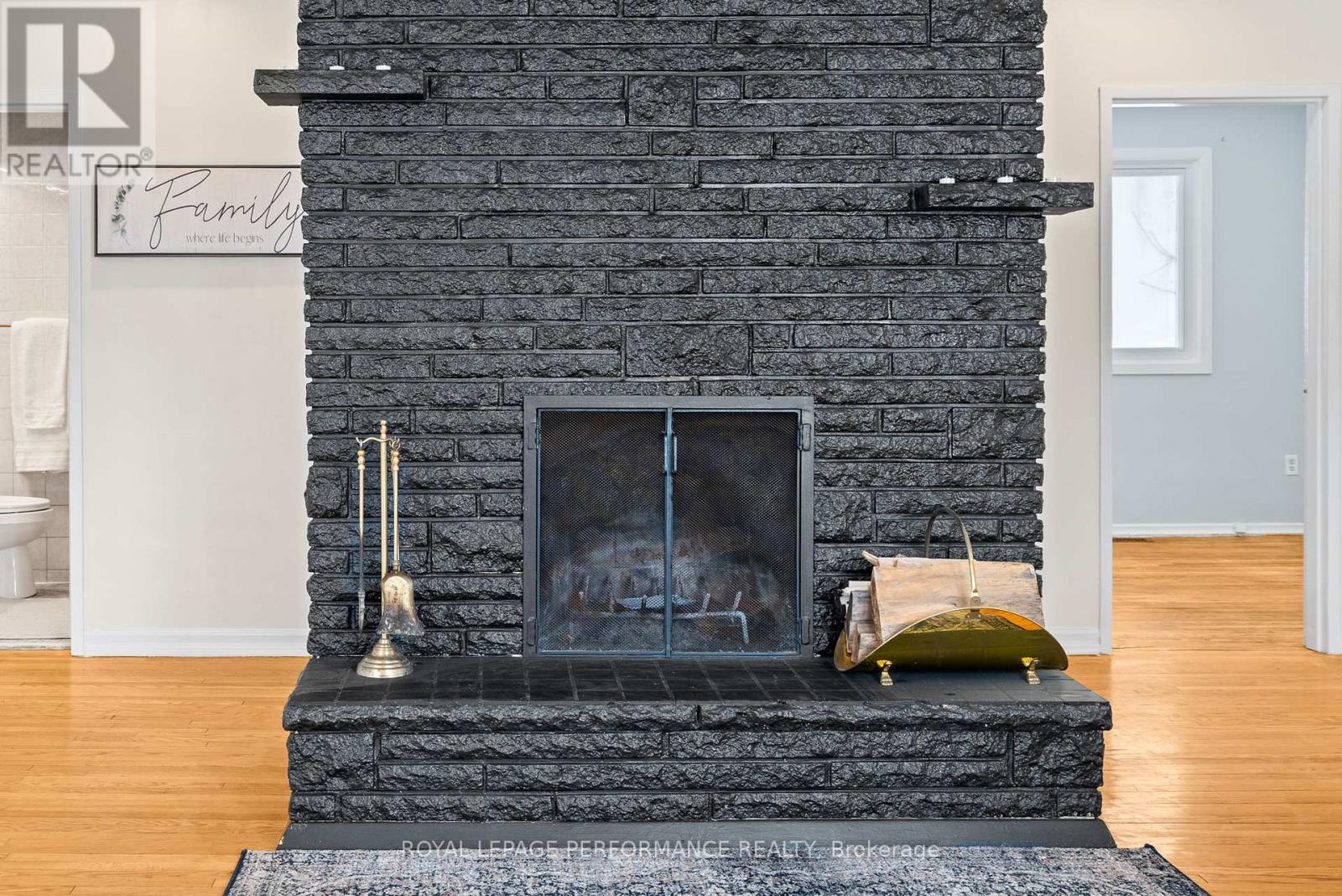 Cozy fireplace to gather around - 1430 Edgecliffe Avenue, Ottawa, ON - Indoor Photo Showing Other Room With Fireplace