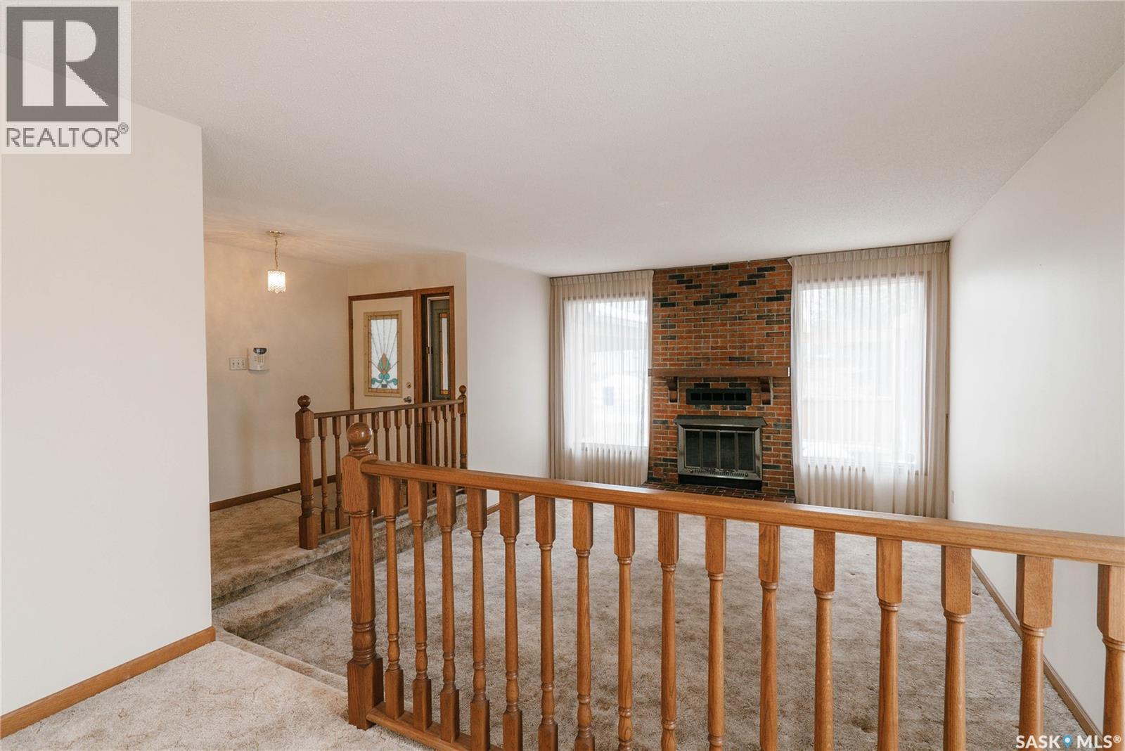 463 Christopher Road, Saskatoon, SK - Indoor Photo Showing Other Room With Fireplace