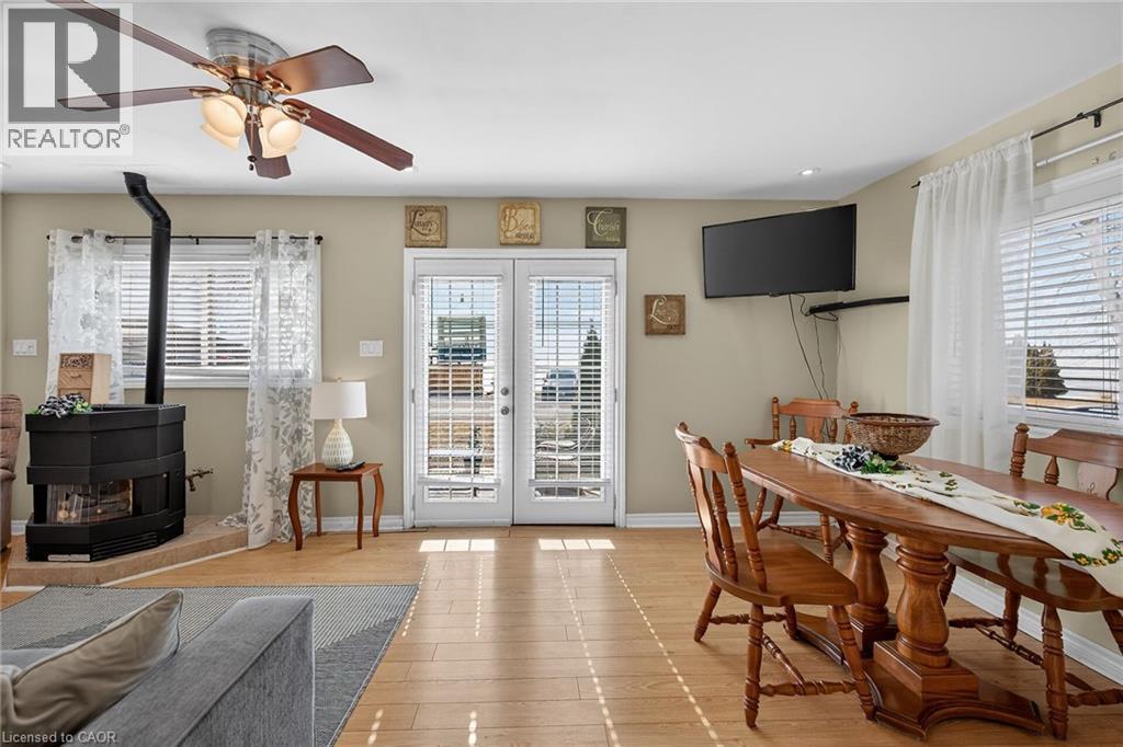 87 Lakeshore Road, Haldimand, ON - Indoor Photo Showing Dining Room With Fireplace