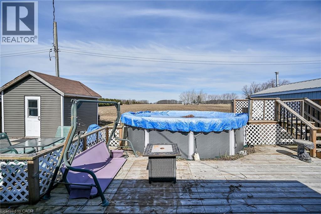 87 Lakeshore Road, Haldimand, ON - Outdoor With Above Ground Pool With Deck Patio Veranda
