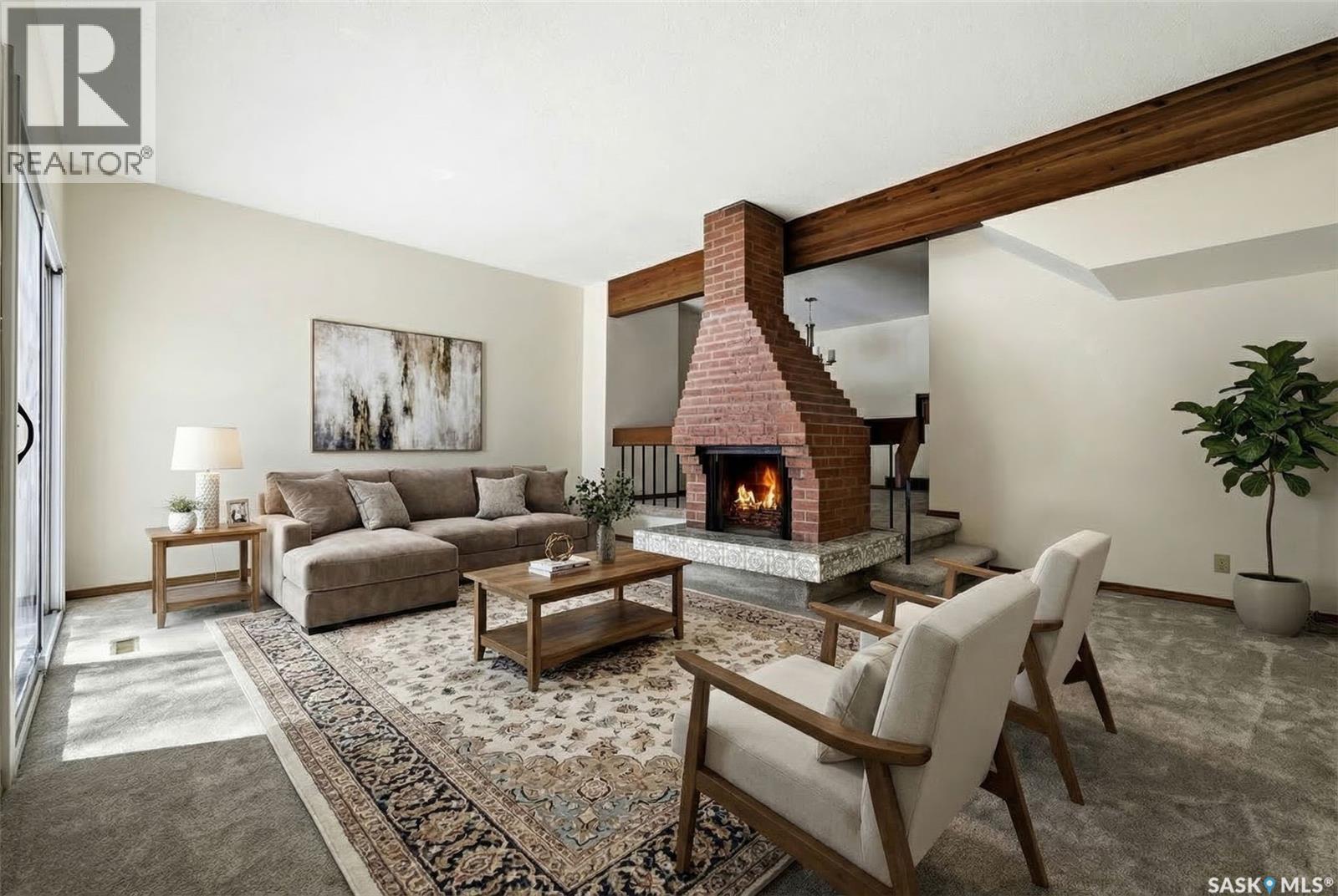 1615 23Rd Avenue, Regina, SK - Indoor Photo Showing Living Room With Fireplace